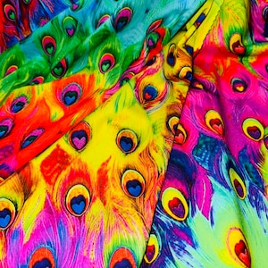 New Exotic Peacock digital design print on best quality of nylon spandex 4-way stretch 58/60”