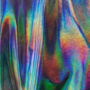 Iridescent metallic black/silver nylon spandex 4way stretch with hologram foil 58/60&quot; Sold by the YD. Ships worldwide from Los Angeles CA.