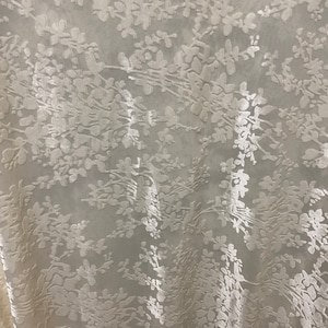 New burnout velvet modern design Ivory color 4-way stretch 58/60” Sold by the YD. Ships worldwide from Los Angeles California USA.