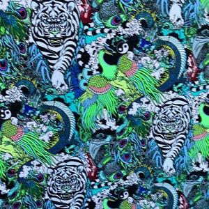New Exotic tiger design with multi animal print on best quality of nylon spandex 4-way stretch 58/60” Sold by the YD.