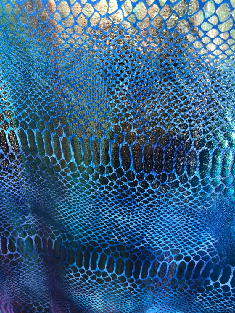 New iridescent metallic nylon spandex dragon design 4way stretch 5860 Sold by the YD Ships worldwide from Los Angeles California USA.