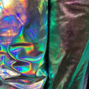 All over foil iridescent silver and Iridescent green color nylon spandex 4way stretch 58/60&quot; Sold by the YD. Ships from Los Ángeles CA USA