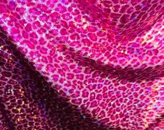 Wild Cheetah design on shattered glass hologram metallic nylon spandex 4-way stretch 58/60” Sold by the YD
