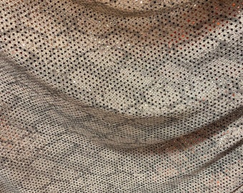 Snake design print on blush metallic poly spandex 2-way 58/60” Sold by the YD. Ships Worldwide from Los Angeles California USA.