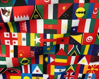 New International multi flags design printed on nylon spandex 4way stretch 58/60&quot; Sold by the YD. Ships worldwide from Los Angeles CA USA.