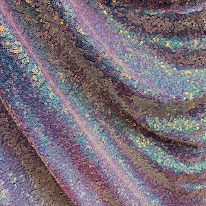 New iridescent mini disco sequins 3mm on stretch mesh 4way 58/60&quot; Sold by the YD. Ships worldwide from Los Angeles California USA.