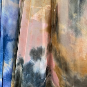 Tie dye power mesh multicolor 4-way stretch 58/60” Sold by the YD. Ships Worldwide from Los Angeles California USA.
