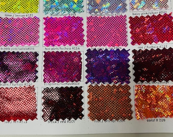 May include: A colour chart of iridescent fabric swatches with different colours and names. The swatches are arranged in rows and columns. The colours include white, silver, neon yellow, gold, lime, lemon, mint, lavender, baby pink, bubble pink, hot pink, fuchsia, black, magenta, red, rust, orange, and coral.