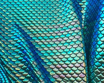 Mermaid design fish scael green with blue turquoise effect Nylon 4way Stretch 58/60" Sold by the YD. Ships worldwide from Los Angeles CA USA