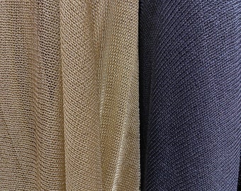 Metallic mesh chain design 2-way stretch 58/60” Sold by the YD. Ships Worldwide from Los Angeles California USA.