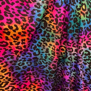 New Exotic leopard design rainbow multicolor 4way print nylon spandex 58/60” Sold by the YD. Ships worldwide from Los Angeles California USA