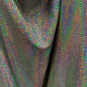 Nieuwe metallic stof met iriserende mini-lovertjes helemaal in twee richtingen rekbaar: 58/60 inch Verkocht per jaar. Verzending wereldwijd vanuit Los Angeles, Californië.