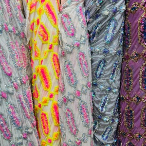 Luxury Geometric Avatar iridescent sequins on stretch power mesh 4-way  50/52” Sold by the YD. Ships worldwide from Los Angeles California