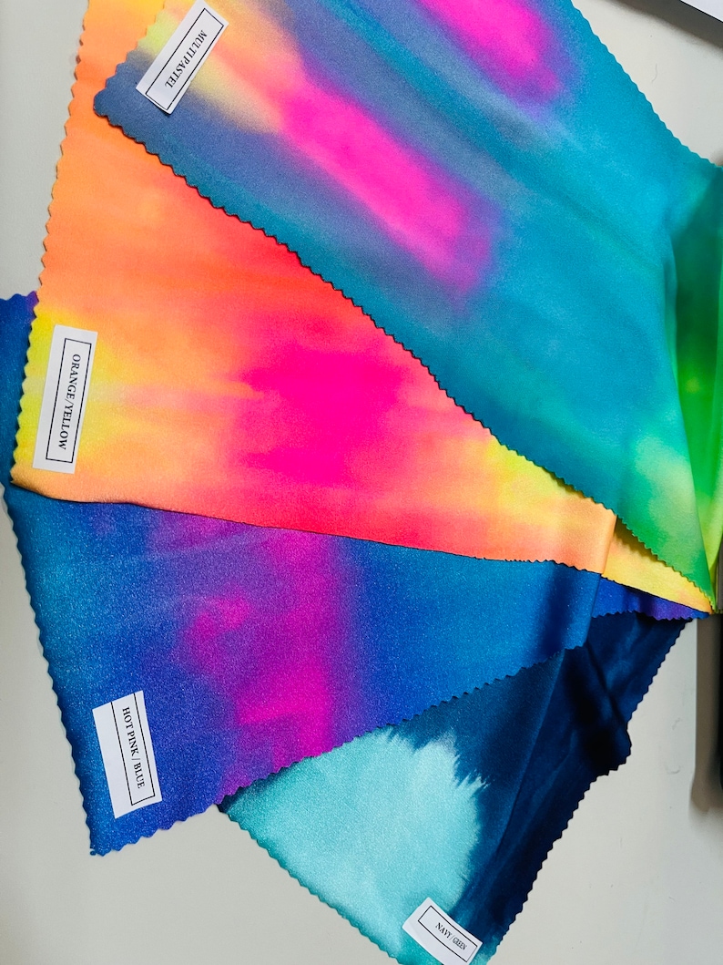 May include: Five fabric swatches in different tie-dye patterns. The swatches are labeled "Navy Green", "Hot Pink/Blue", "Orange Yellow", and "Molly Pastel".