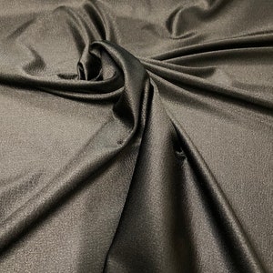 Lizard jumbo embossed great quality of nylon spandex 4-way stretch 58/60” Sold by the YD. Ships worldwide from Los Angeles California USA. image 1