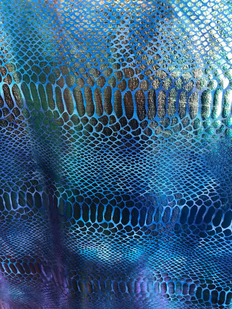 New iridescent metallic nylon spandex dragon design 4way stretch 5860 Sold by the YD Ships worldwide from Los Angeles California USA.