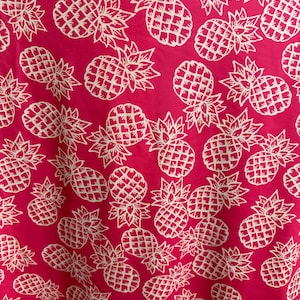 Tropical Pineapple design pink/white print on best quality of nylon spandex 4-way stretch 58/60” Sold by the YD.