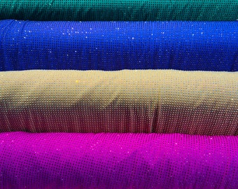 New Luxury Rhinestone on spandex base 4-way stretch 58/60” Sold by the YD. Ships Worldwide from Los Angeles California USA.