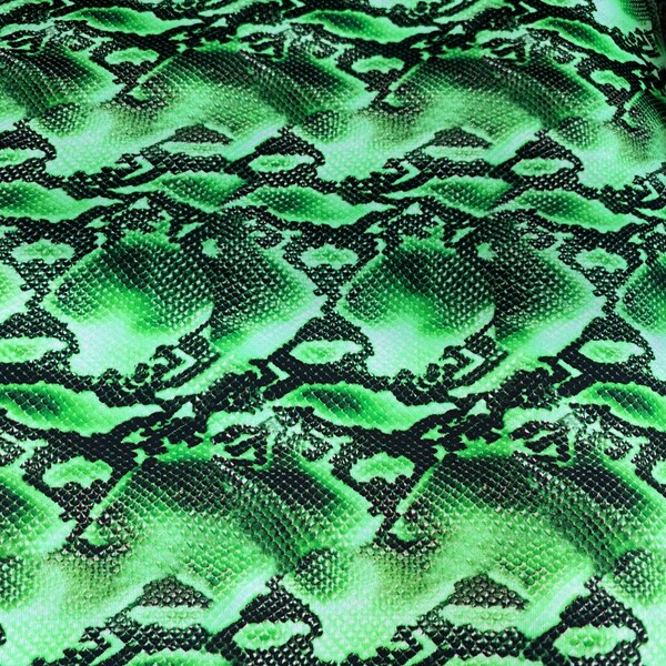 New venom snake design green/black print on best quality of nylon spandex 4-way stretch 58/60” Sold by the YD. Ships worldwide from L.A CA