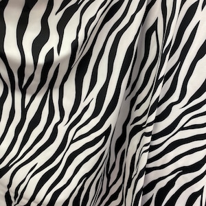 Nouveau motif zébré exotique sur nylon élasthanne extensible dans les 4 sens 58/60 po. Vendu au DD. Expédition dans le monde entier depuis Los Angeles, Californie, États-Unis.