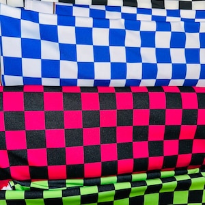 Deluxe checkers design print on great quality of nylon spandex 4-way stretch 58/60” Sold by the YD. Ships worldwide from L.A