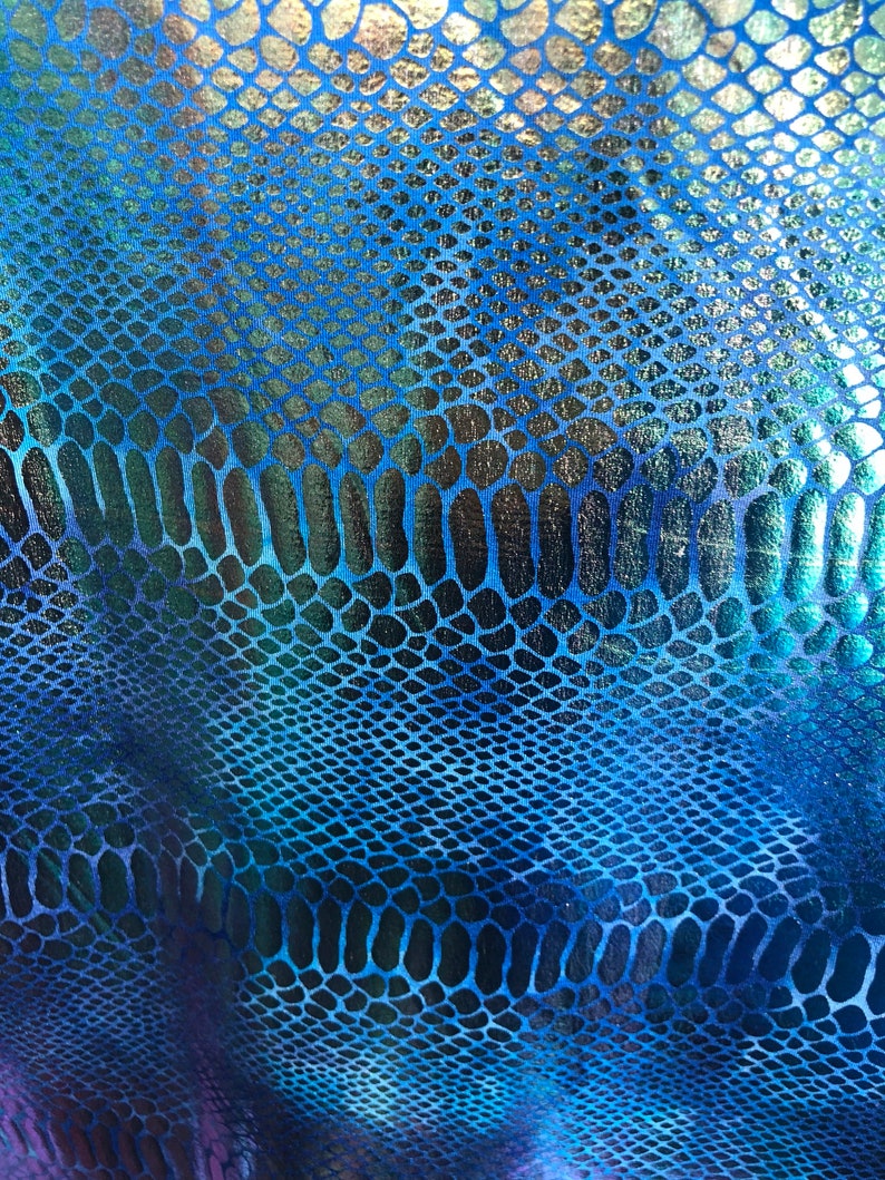 New iridescent metallic nylon spandex dragon design 4way stretch 5860 Sold by the YD Ships worldwide from Los Angeles California USA.
