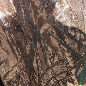New sequin geometric design on stretch mesh base 2 way stretch 58/60&quot; Sold by the yd. Ships worldwide from Los Angeles California USA.