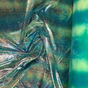 New Iridescent hologram snake design with tie dye ilusión foil 4way stretch 58/60&quot; Sold by the YD. Ships worldwide from Los Angeles CA USA.