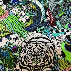 New Exotic Tattoo Jungle design multi animal print on best quality of nylon spandex 4-way stretch 58/60” Sold by the YD.