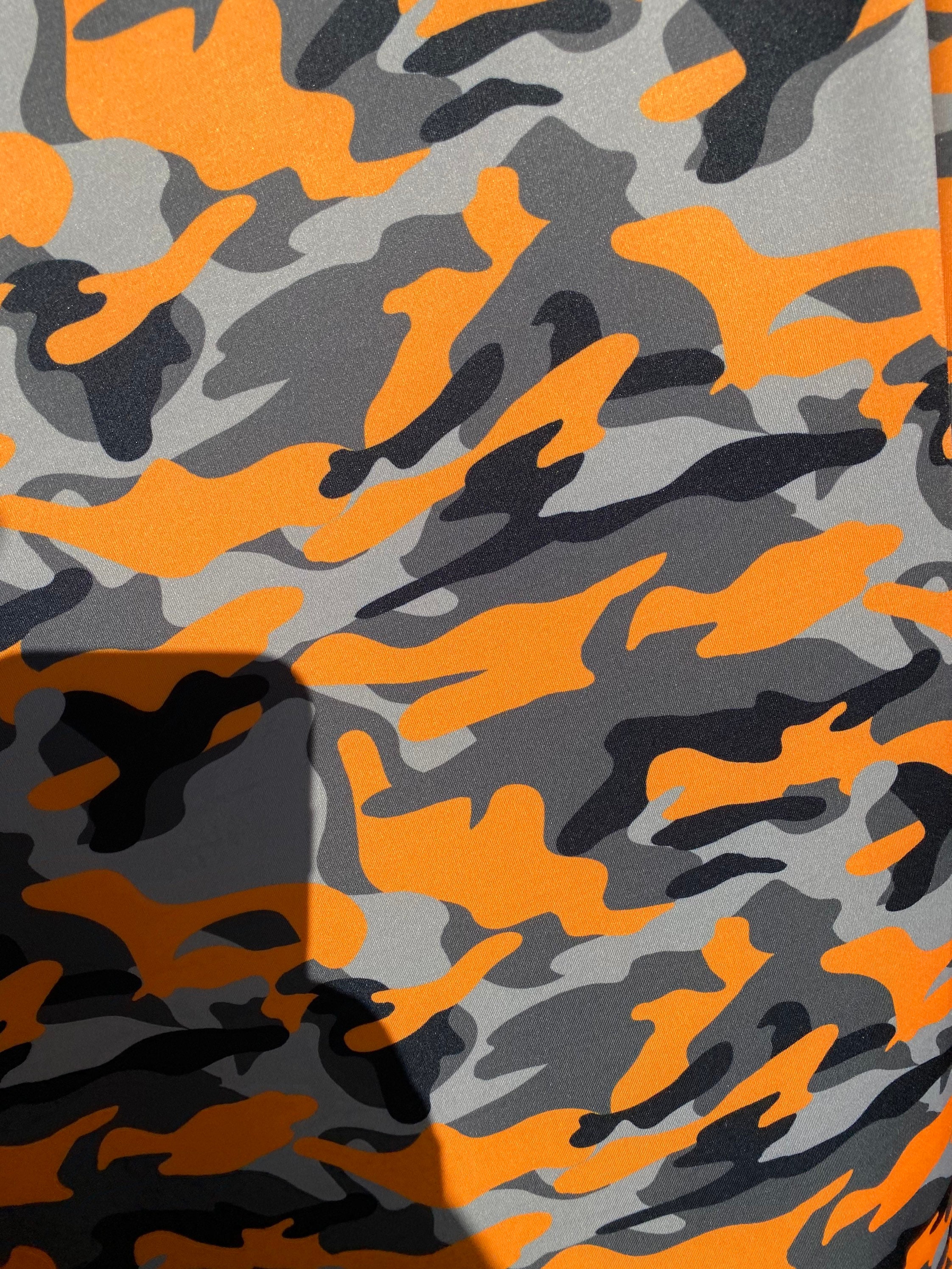 New Modern Camouflage Orange/black/gray Print on Great Quality of Nylon  Spandex 4-way Stretch 58/60 Sold by the YD. 