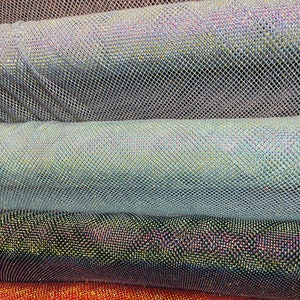 New Luxury Rhinestone stretch mesh fabric 4-way stretch 58/60” Sold by the YD. Ships Worldwide from Los Angeles California USA.
