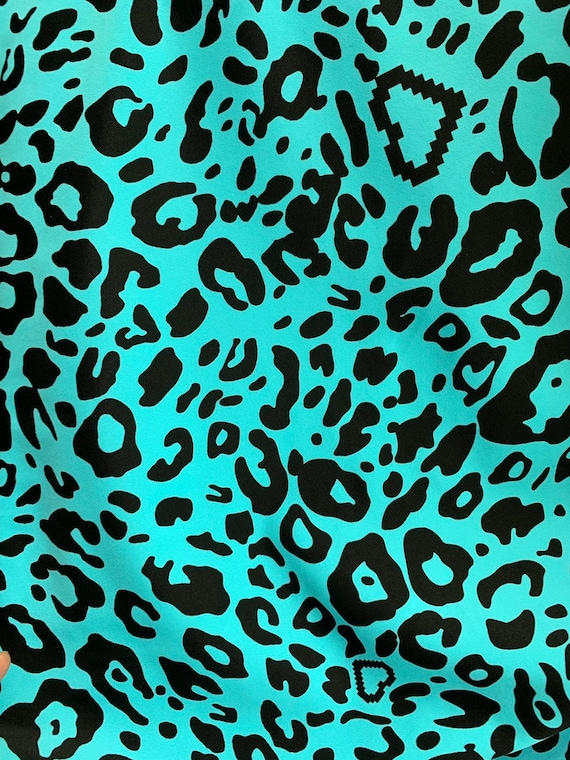 New leopard design Tiffany/black print on nylon spandex 4way stretch 58/60" Sold by the YD. Ships worldwide from Los Angeles California USA.