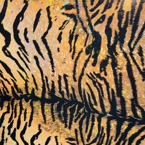 Puede incluir: Primer plano de una tela de estampado de tigre con rayas negras y un fondo naranja brillante.