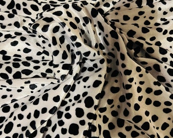 New Dalmatian design print on best quality of stretch velvet 4-way stretch 58/60” Sold by the YD. Ships worldwide from Los Angeles CA USA