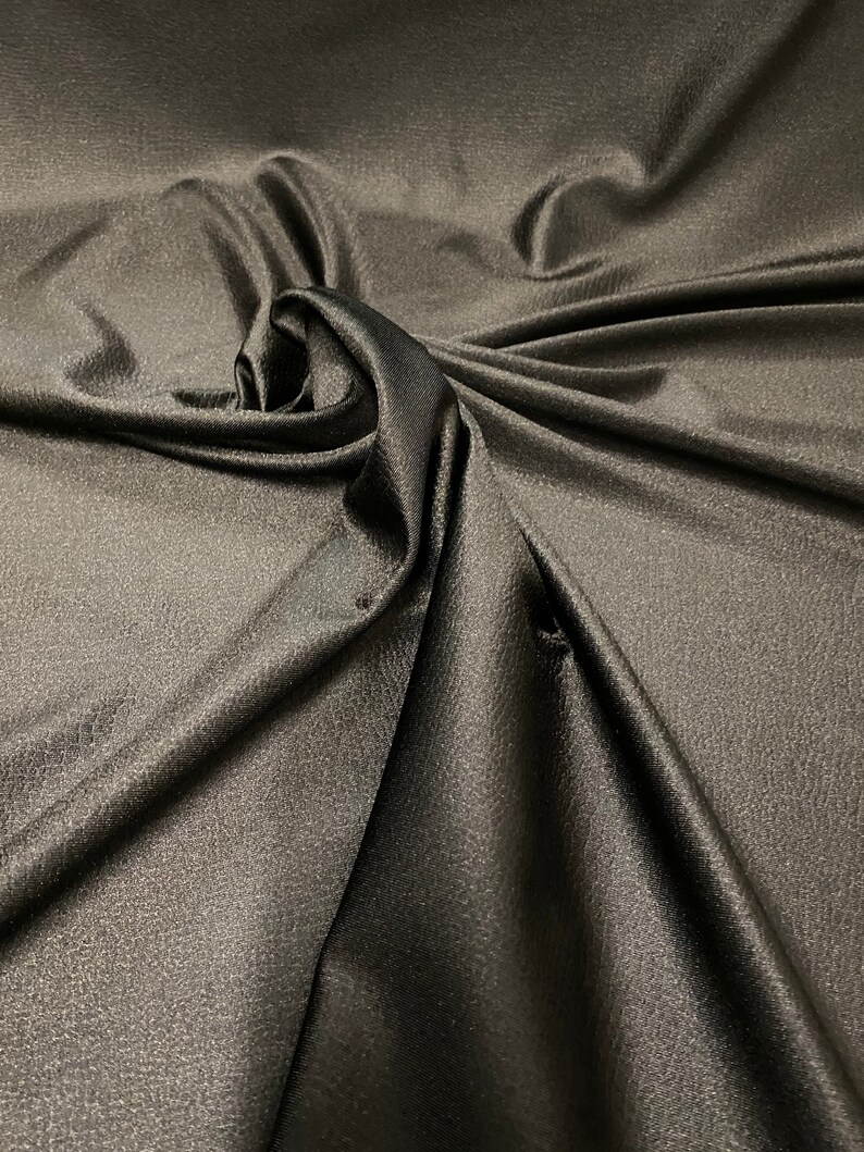 Lizard jumbo embossed great quality of nylon spandex 4-way stretch 58/60” Sold by the YD. Ships worldwide from Los Angeles California USA. image 6