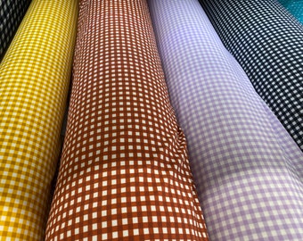 Gingham design 1/4” squares printed in best quality of nylon spandex 4-way stretch 58/60” Sold by the YD. Ships Worldwide from Los Angeles