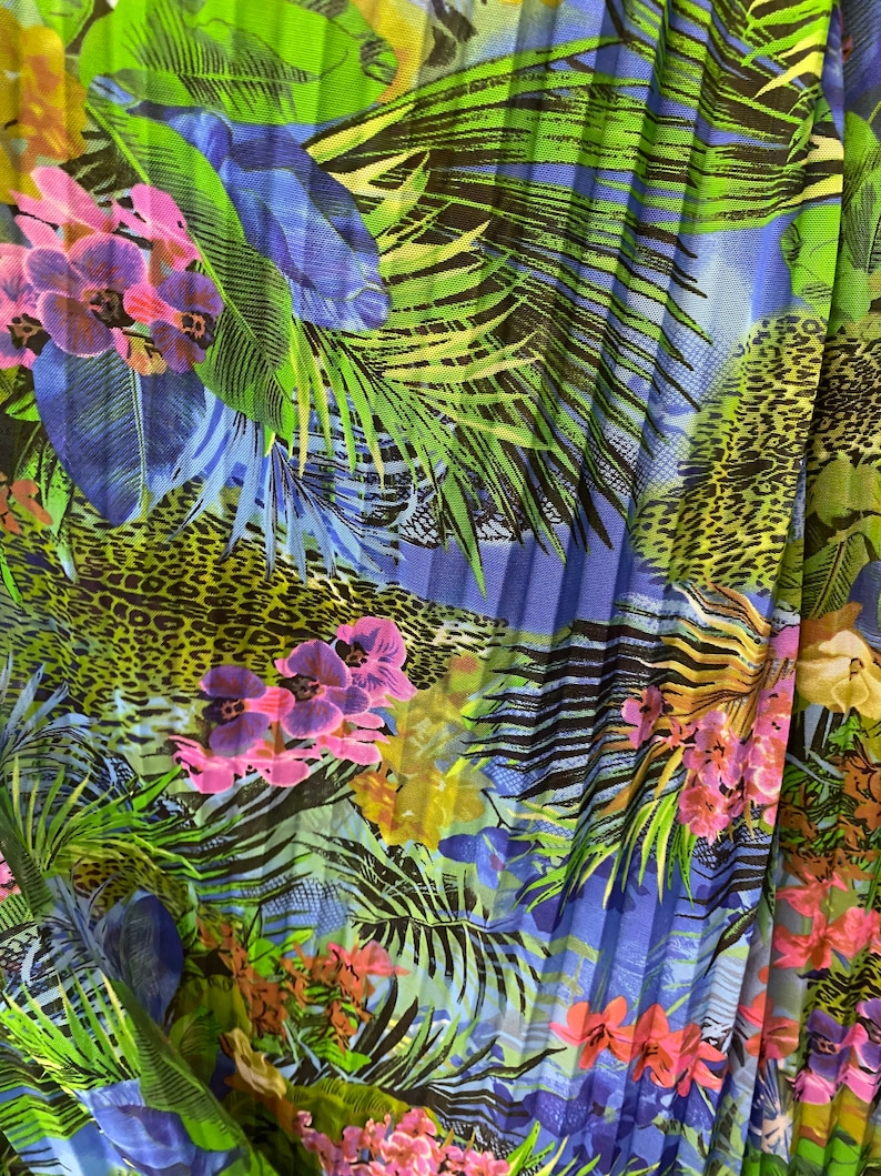 Ships worldwide from Los Angeles CA USA. New Hiding Exotic Leopard design print on pleated power mesh 4-way stretch 5860\u201d Sold by the YD