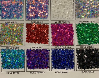 New Disney sequins cosmic iridescent mini glitz sequins embroidered on stretch power mesh 4-Way 55/56" Sold by the YD. Ships worldwide