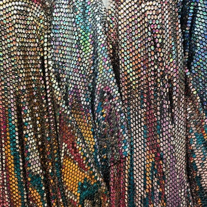 Honeycomb geometric design metallic spandex with shiny sequins 2-way stretch 58/60” Sold by the YD. Ships worldwide from L.A