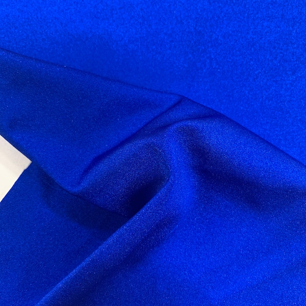 Shining tricot Sapphire Blue nylon spandex 4way stretch 58/60" Sold by the YD. Ships worldwide from Los Angeles California USA.