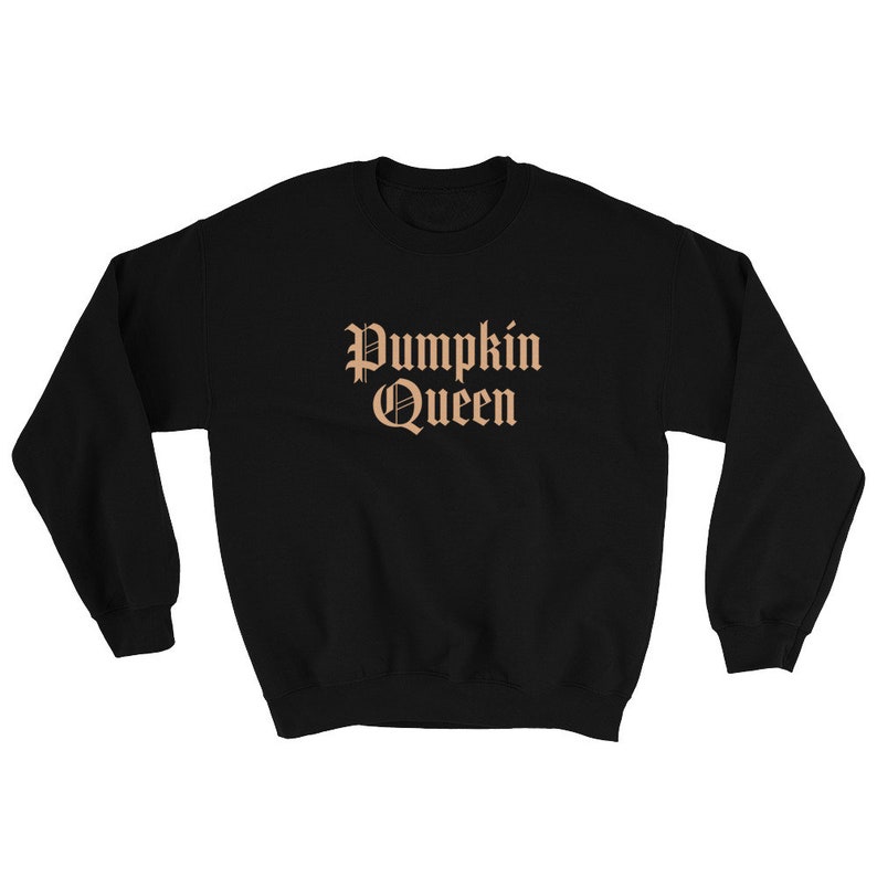 May include: Black sweatshirt with the text "Pumpkin Queen" in a brown, old English font.