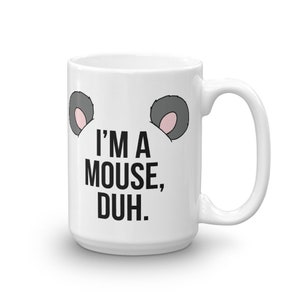 May include: White ceramic mug with a black and white illustration of a mouse's ears and the text "I'M A MOUSE, DUH."