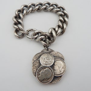 NAPIER Charm Bracelet - Faux Foreign Coins