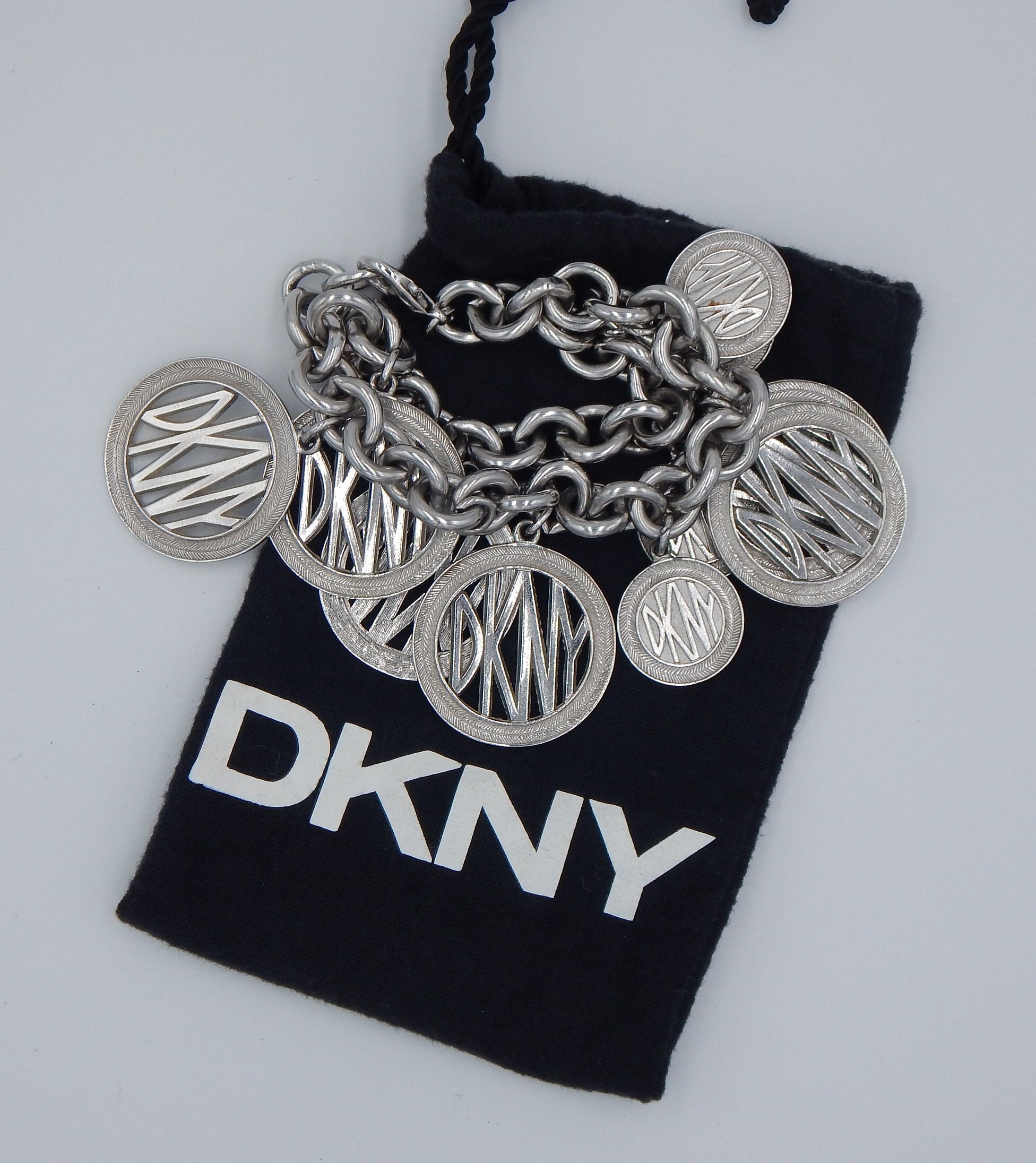 DKNY Soho Three-Hand Gold-Tone Stainless Steel Bangle Watch - NY2307 -  Watch Station