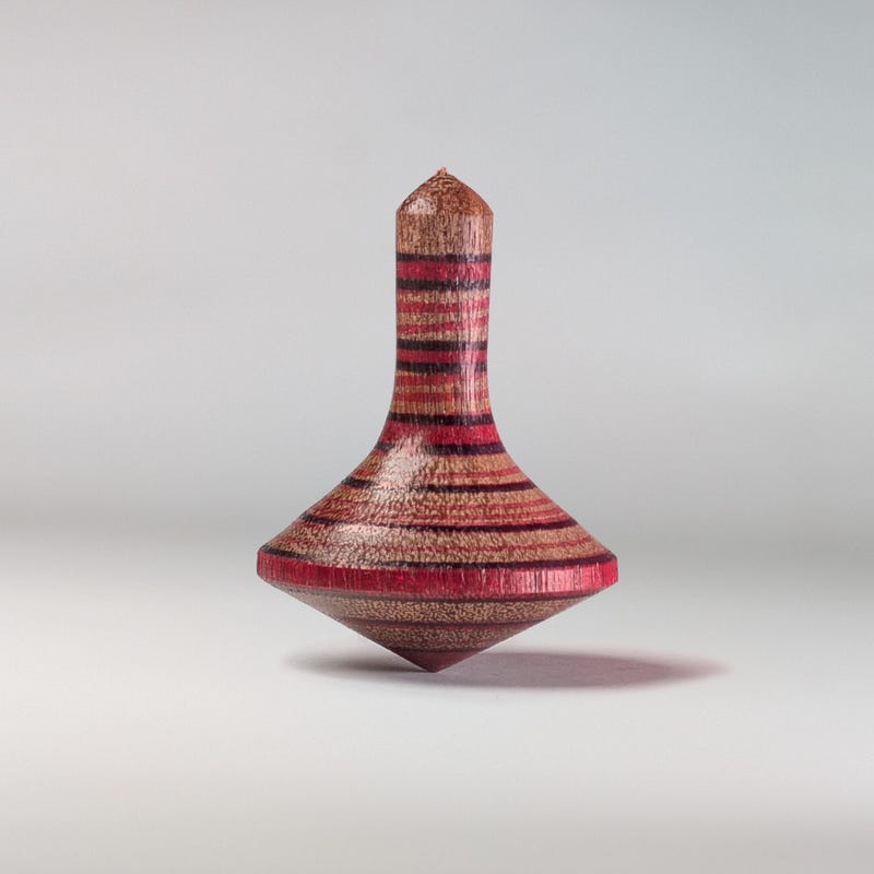 View of Wooden Spinning Tops - Etsy