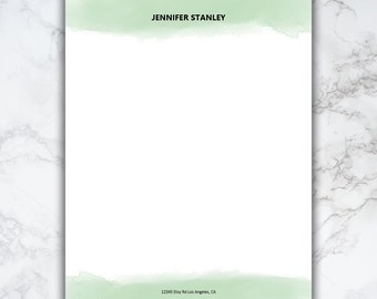 May include: A white letterhead template with a light green watercolor design at the top and bottom. The text "JENNIFER STANLEY" is centered at the top of the page. The address "12345 Etsy Rd Los Angeles, CA" is centered at the bottom of the page.