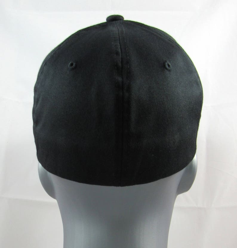 May include: A black baseball cap with a curved brim. The cap is made of a soft, comfortable fabric.