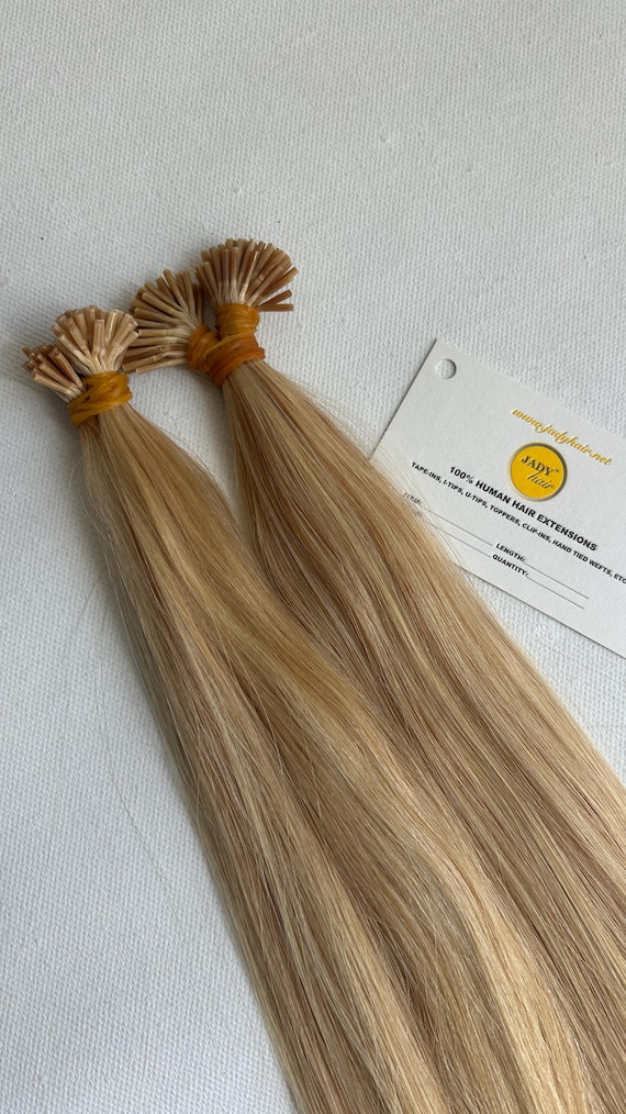 Color P613/27  Golden Blonde highlighted with warm blonde, I-Tip Hair22", 0.5G/strand   100Sts/pack Wavy and Straight