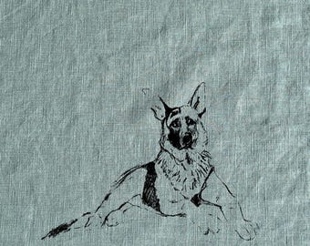 May include: Black and white line drawing of a German Shepherd dog lying down on a light blue textured background.