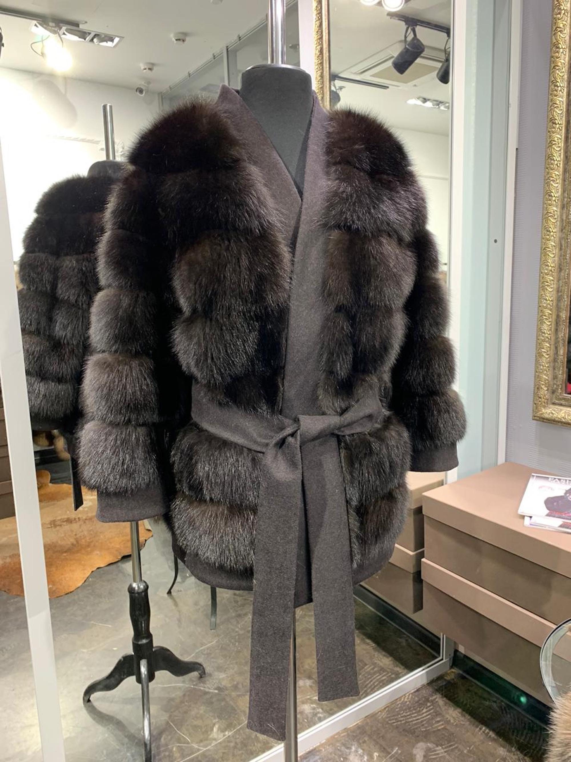 Coat made of dark marten fur with a belt